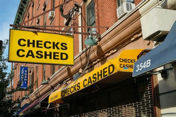 Can I cash a cheque at the Money Shop?